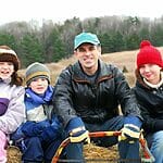 A Family with homeschooling high school children are outdoor