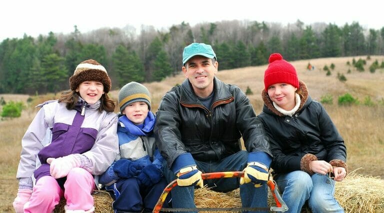 A Family with homeschooling high school children are outdoor